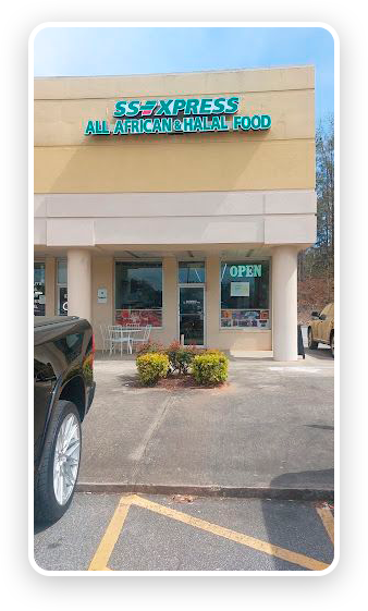 A car parked in front of a store.